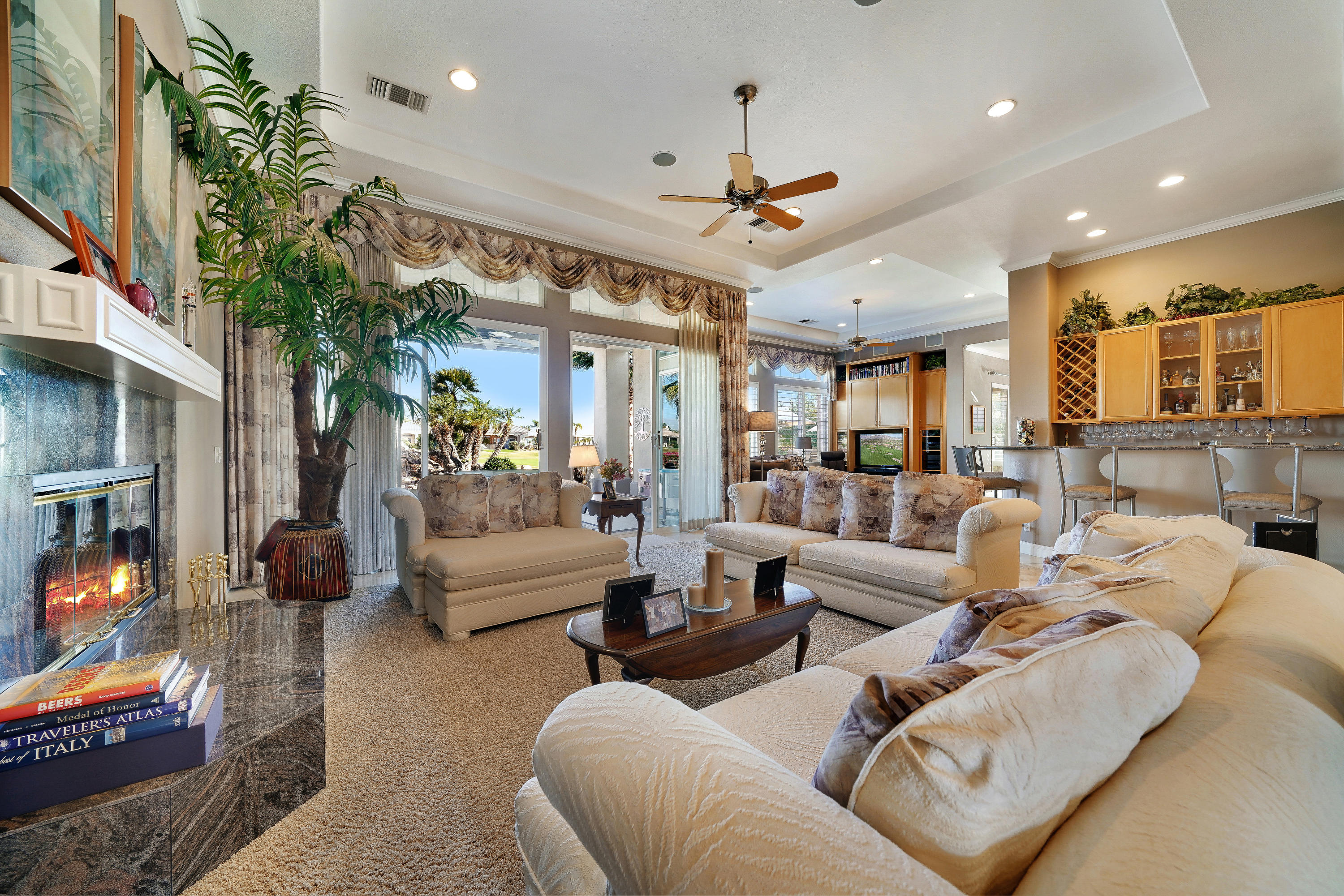 4 Vía Verde Rancho Mirage, CA 92270 - Photo 11 of 63 a living room with furniture kitchen view and a large window