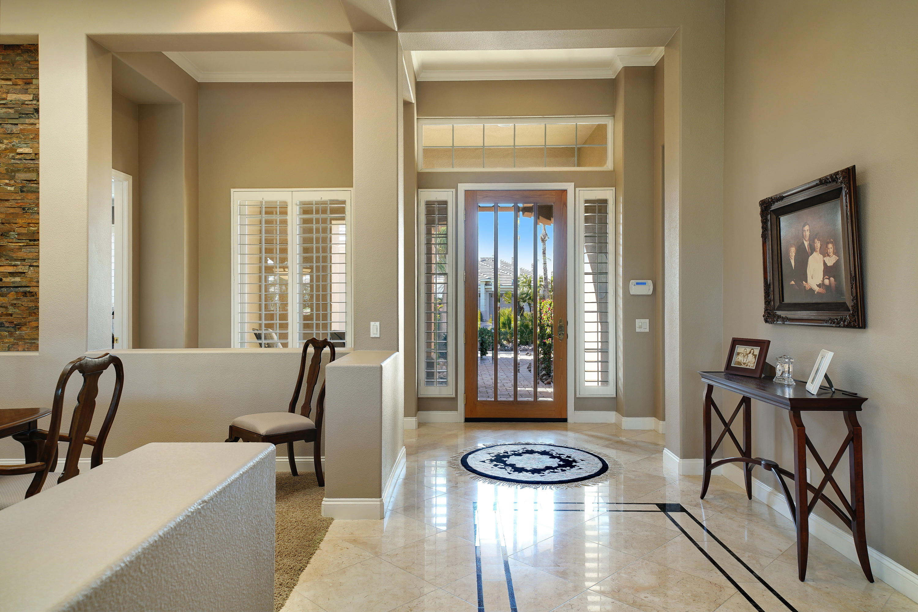 4 Vía Verde Rancho Mirage, CA 92270 - Photo 13 of 63 a living room with furniture and a window