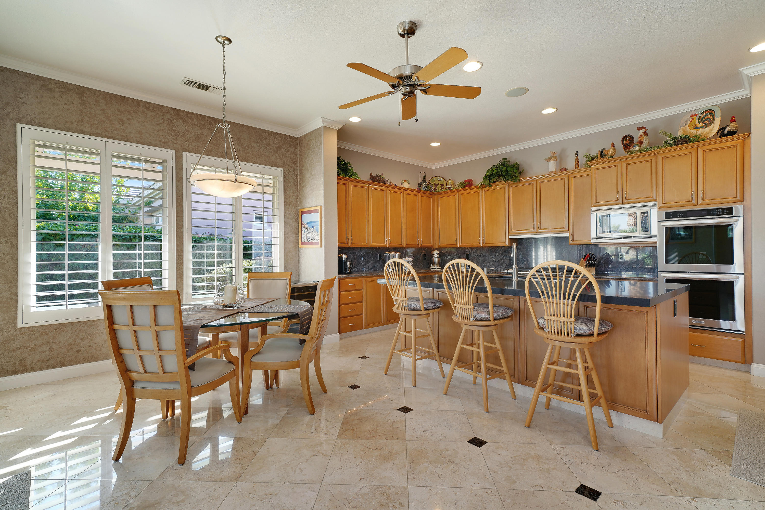 4 Vía Verde Rancho Mirage, CA 92270 - Photo 15 of 63 a view of a dining room with furniture
