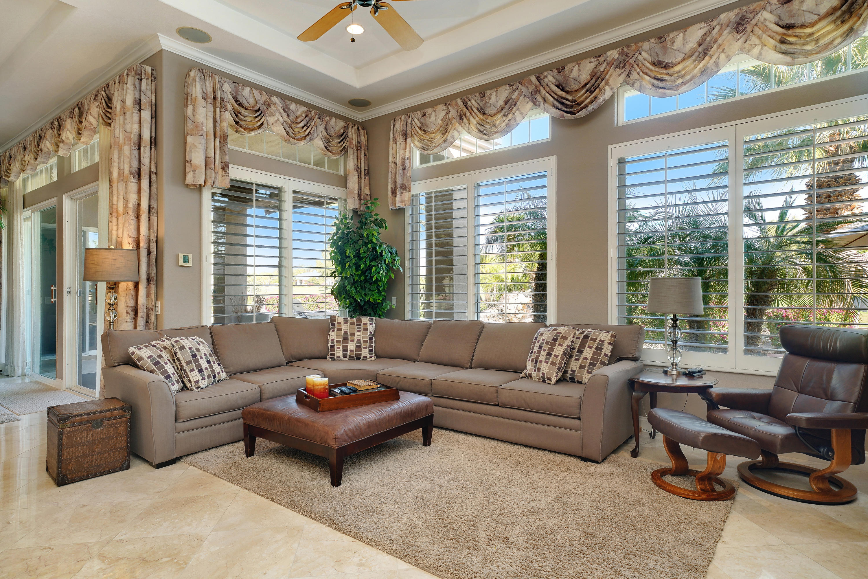 4 Vía Verde Rancho Mirage, CA 92270 - Photo 17 of 63 a living room with furniture and a large window