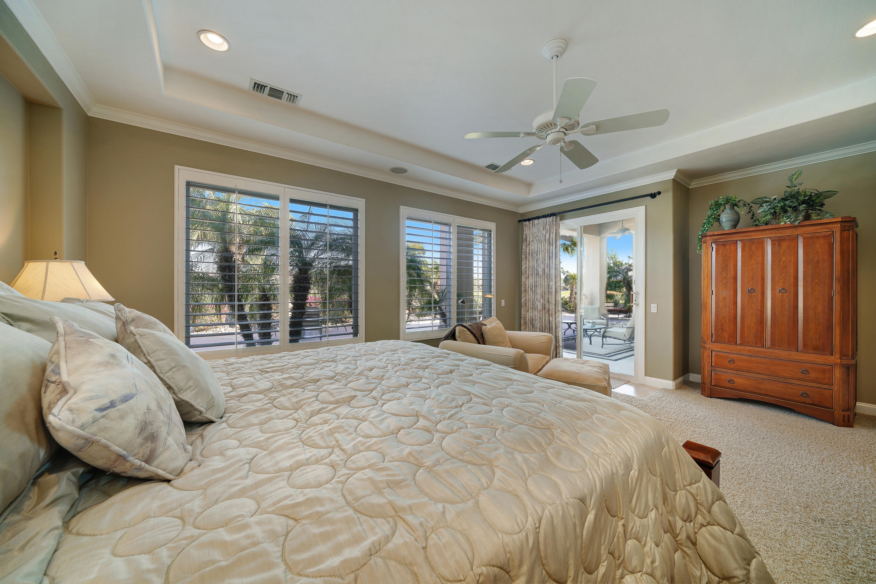 4 Vía Verde Rancho Mirage, CA 92270 - Photo 23 of 63 a bed sitting in a spacious bedroom next to a window