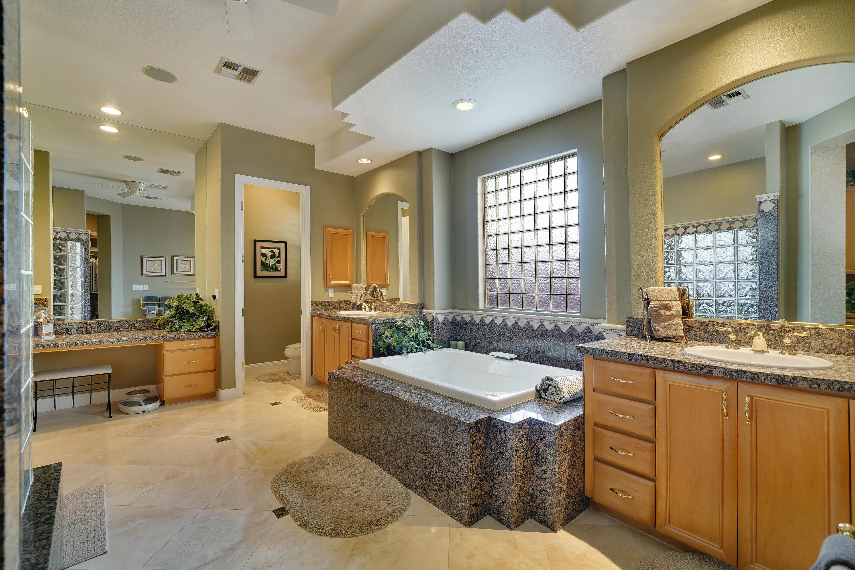 4 Vía Verde Rancho Mirage, CA 92270 - Photo 24 of 63 a large spacious bathroom with a large tub and sink