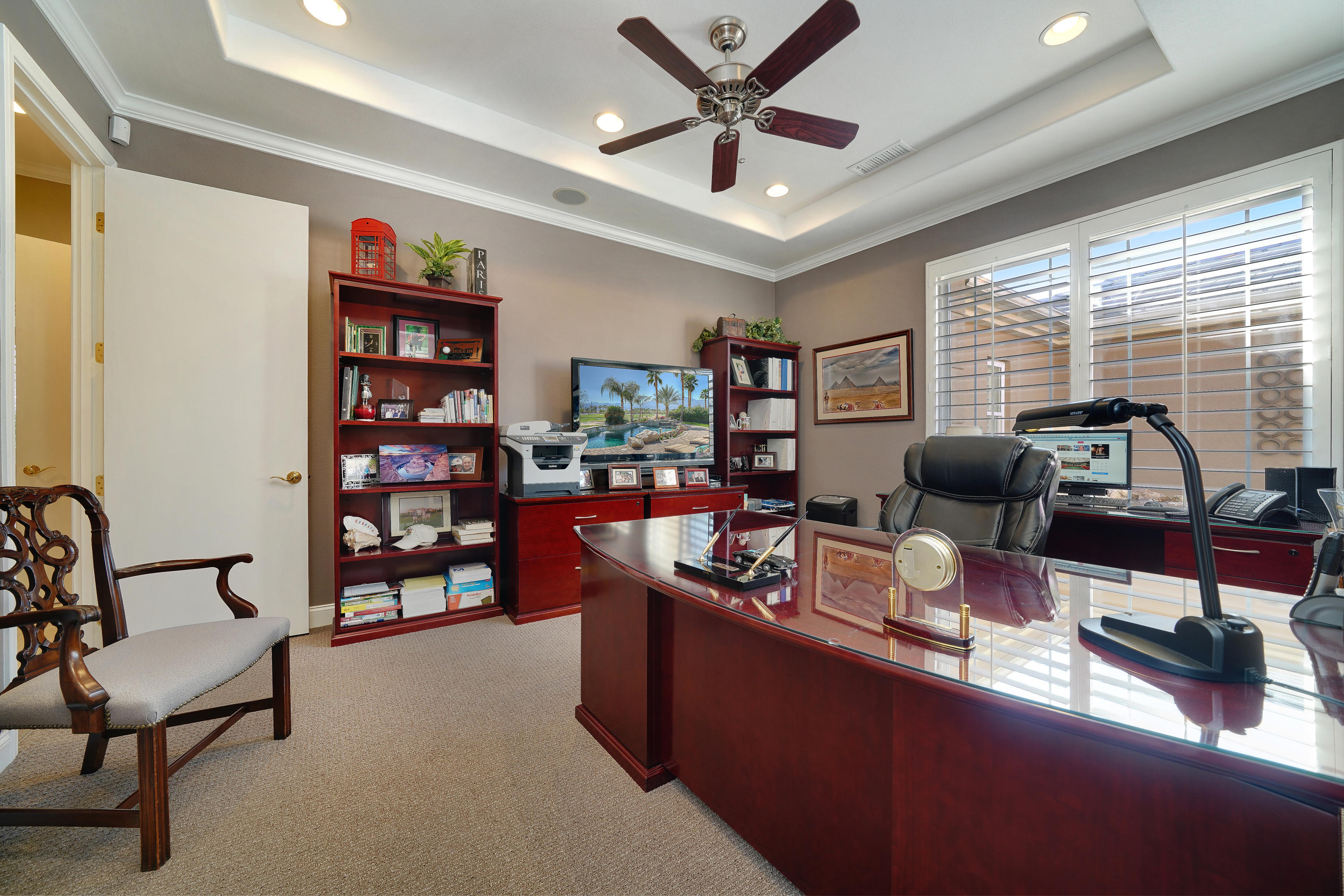 4 Vía Verde Rancho Mirage, CA 92270 - Photo 27 of 63 a living room with furniture and a large window