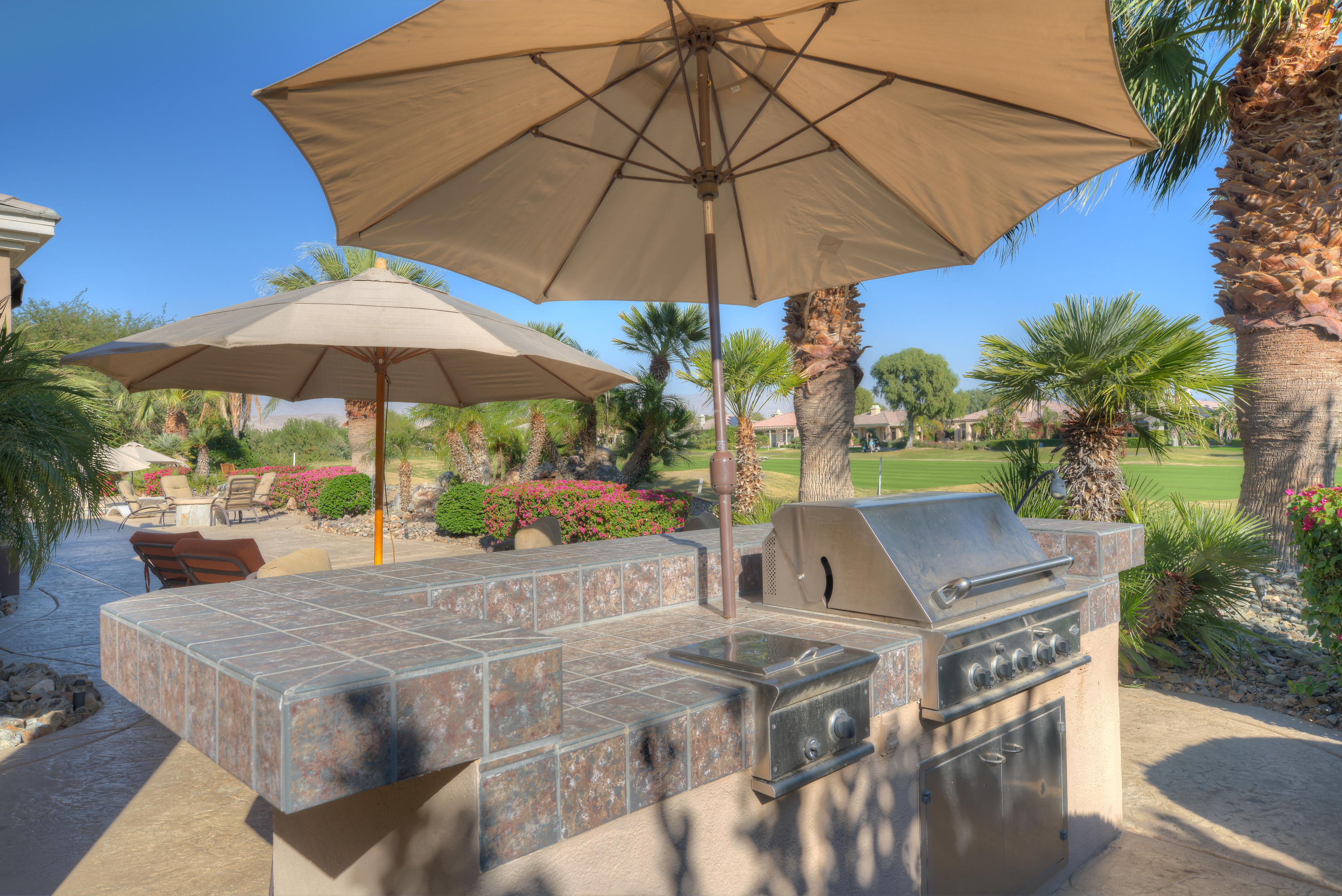 4 Vía Verde Rancho Mirage, CA 92270 - Photo 46 of 63 a view of a backyard with sitting area