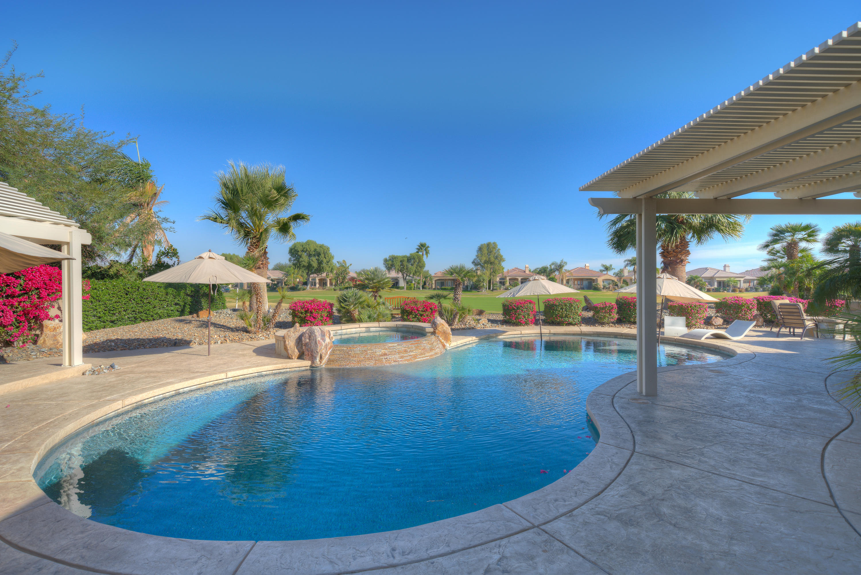 4 Vía Verde Rancho Mirage, CA 92270 - Photo 49 of 63 a view of a swimming pool with a patio