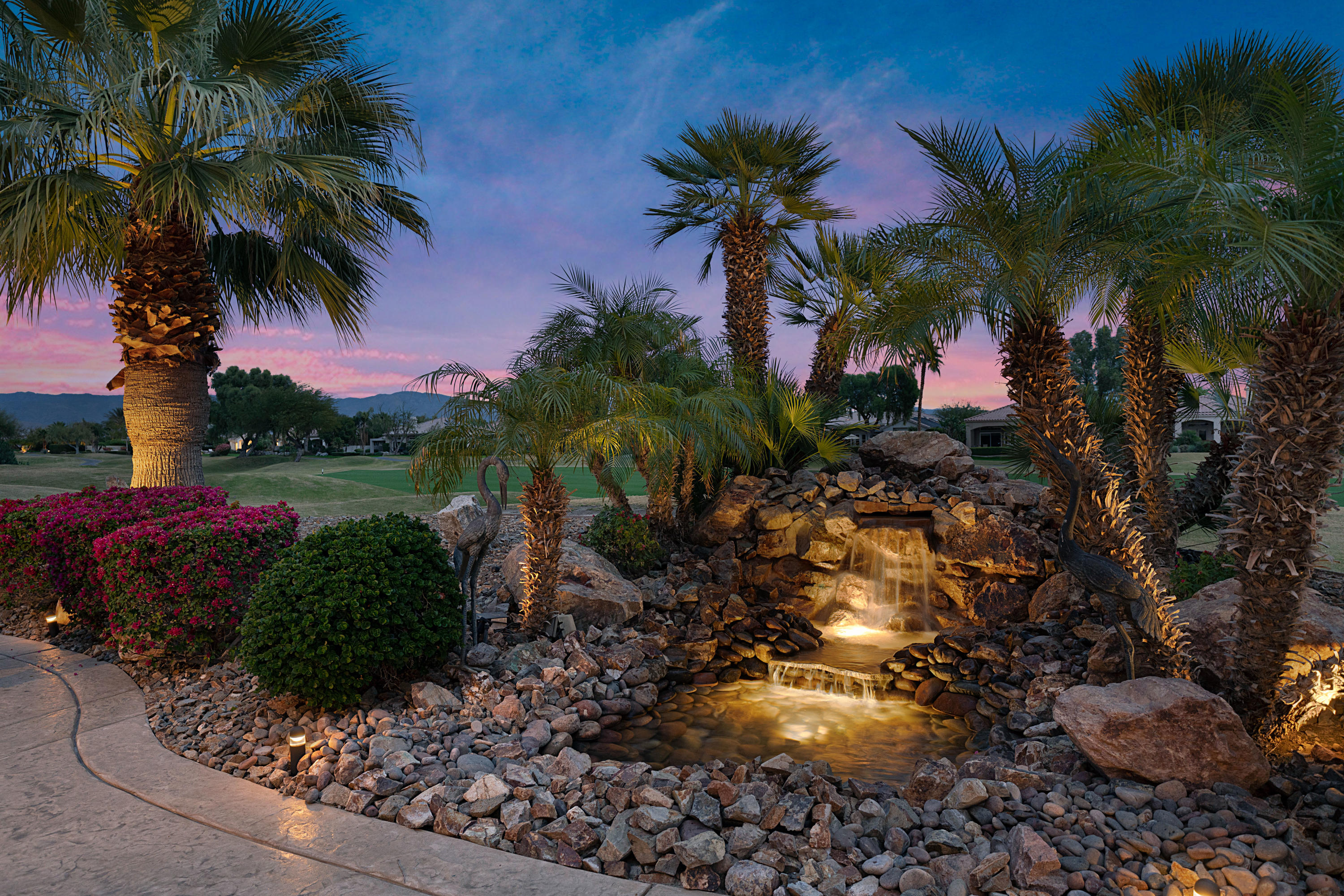 4 Vía Verde Rancho Mirage, CA 92270 - Photo 55 of 63 a view of a yard with a palm tree