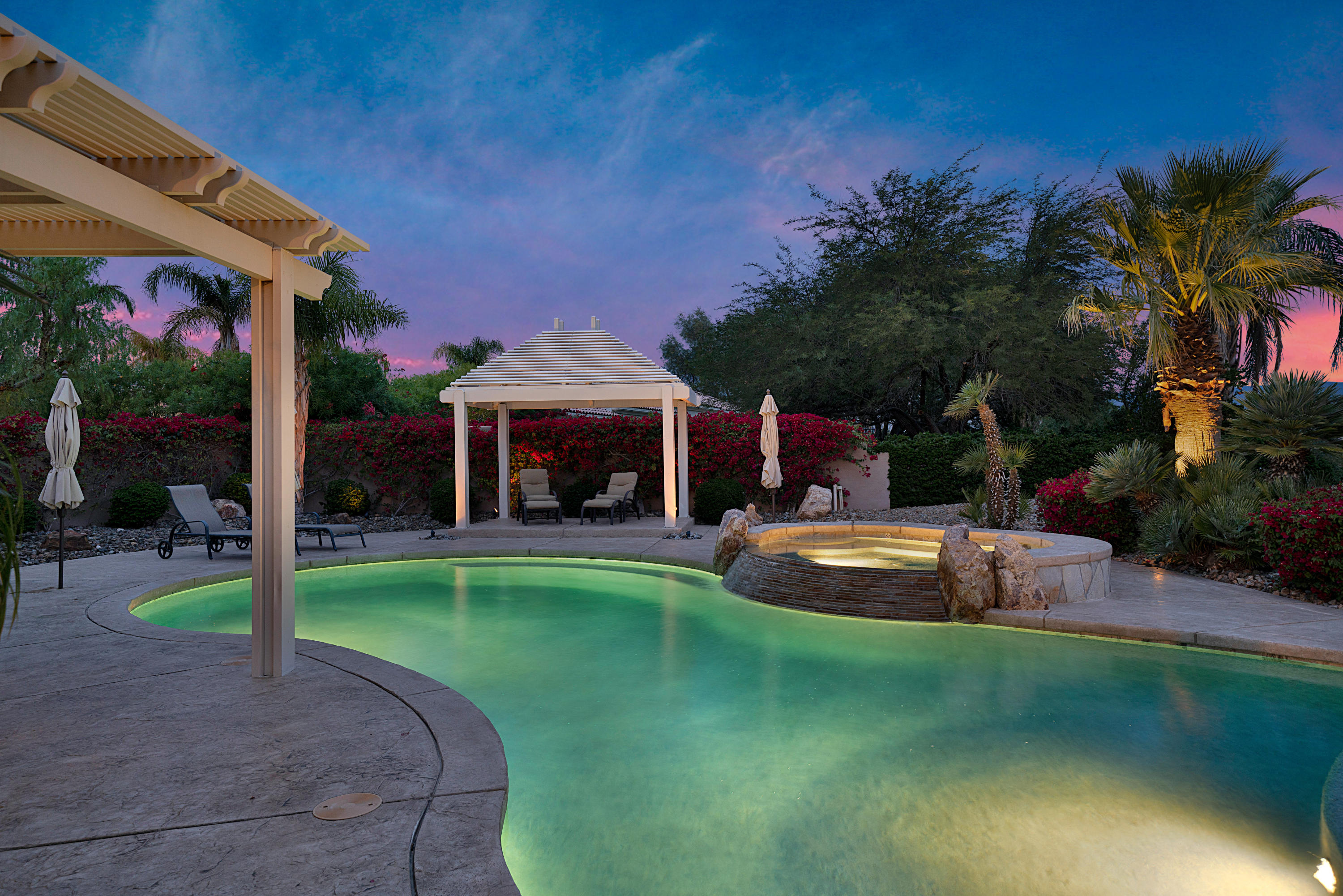 4 Vía Verde Rancho Mirage, CA 92270 - Photo 58 of 63 a view of a house with backyard porch and sitting area