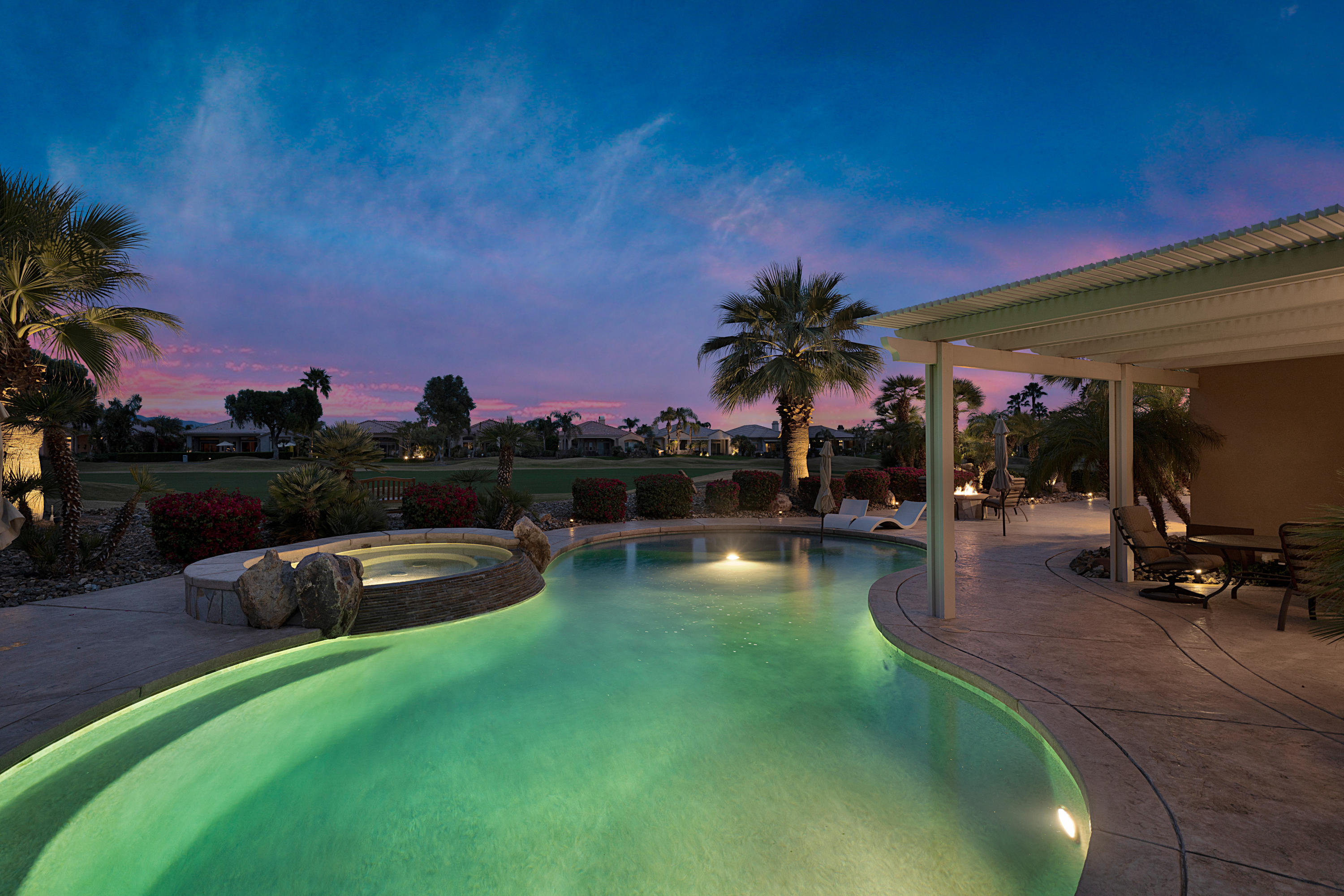 4 Vía Verde Rancho Mirage, CA 92270 - Photo 61 of 63 a view of a swimming pool with a patio
