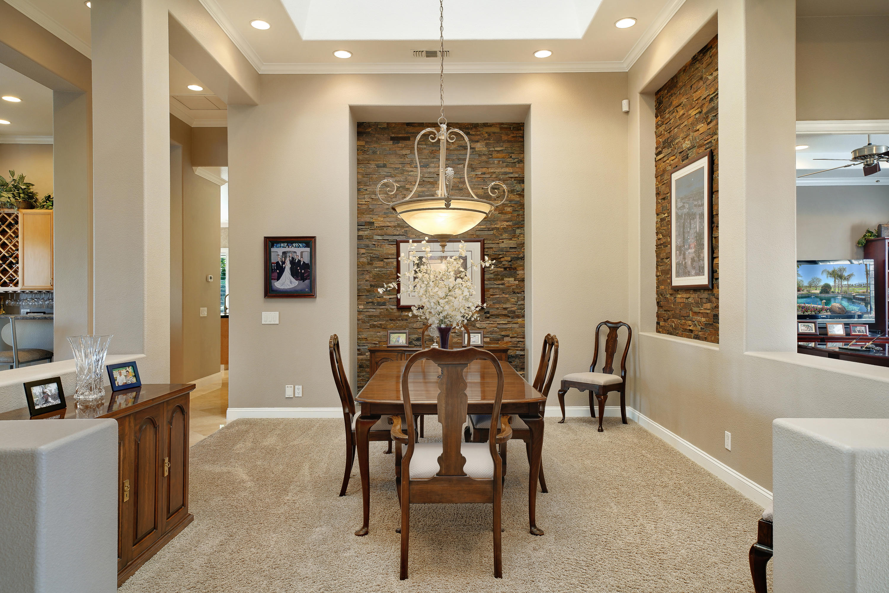 4 Vía Verde Rancho Mirage, CA 92270 - Photo 9 of 63 a view of a dining room with furniture and window