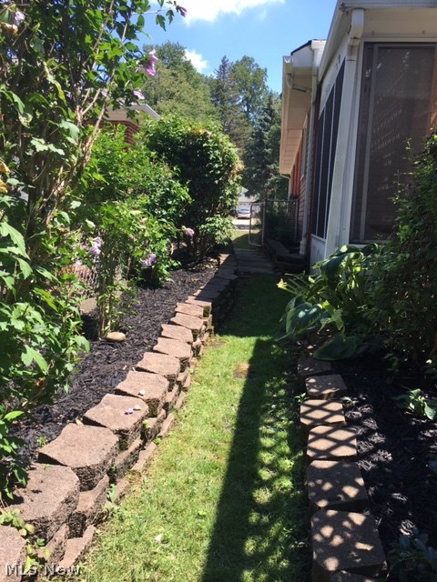 1160 Blanchester Road Lyndhurst, OH 44124 - Photo 16 of 19 Gorgeously landscaped and fenced in yard