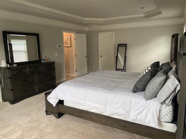 1846 Hamilton Lake Parkway Buford, GA 30519 - Photo 3 of 15 a bedroom with a bed and a dresser