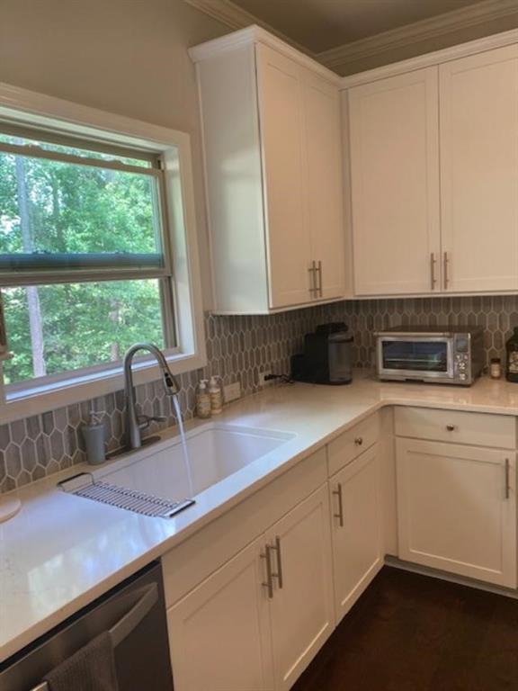 1846 Hamilton Lake Parkway Buford, GA 30519 - Photo 5 of 15 a kitchen with a sink and large window