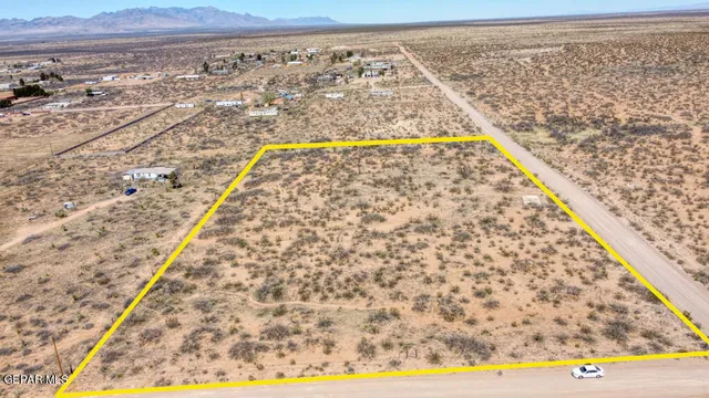 a view of a lake with mountains in the background