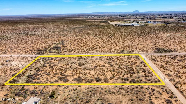 a view of a lake with mountains in the background