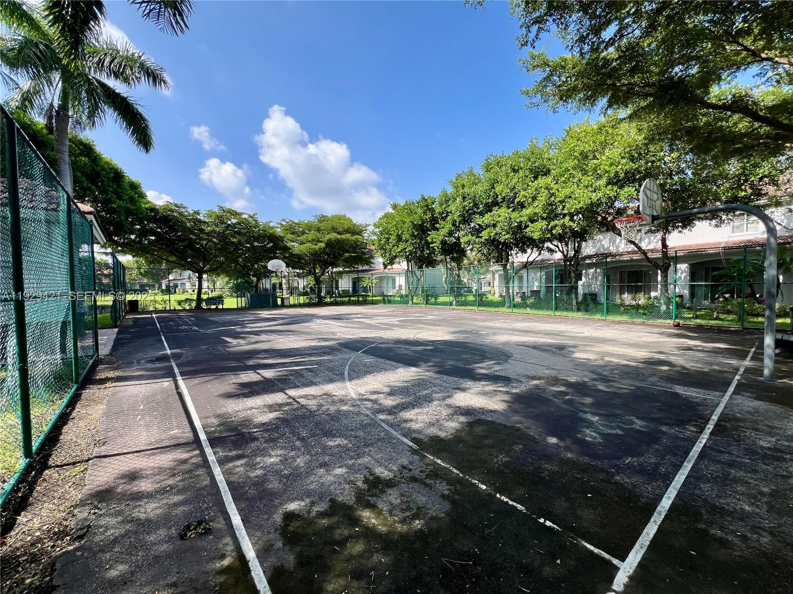 8208 Southwest 29th Street, Unit 101 Miramar, FL 33025 - Photo 18 of 19 a view of a yard with plants and trees
