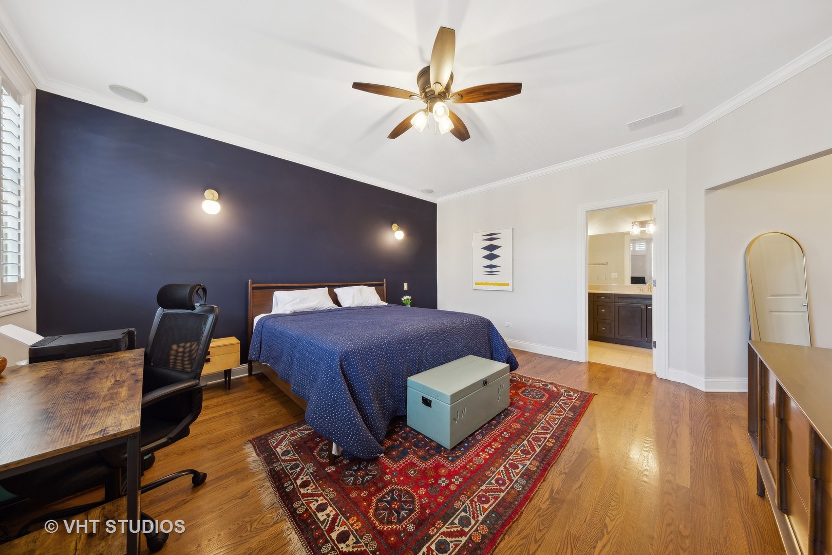 2136 West Division Street, Unit 3 Chicago, IL 60622 - Photo 16 of 37 a spacious bedroom with a bed and wooden floor