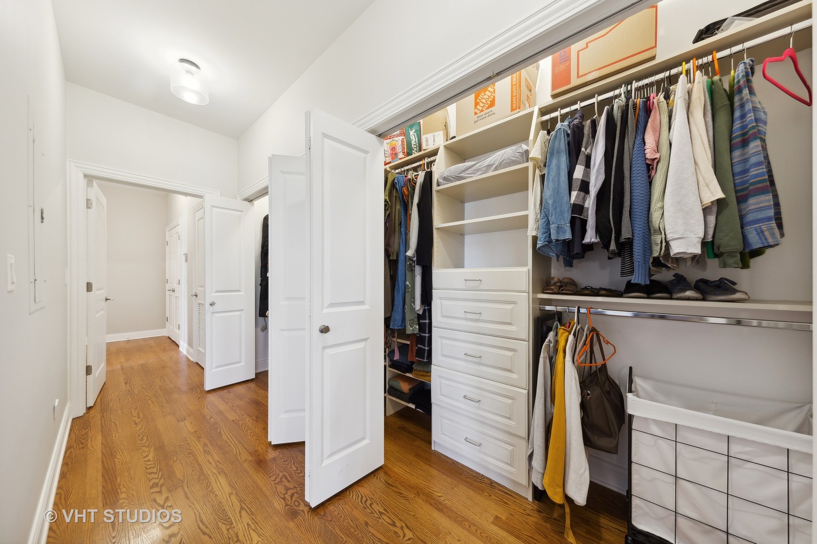 2136 West Division Street, Unit 3 Chicago, IL 60622 - Photo 21 of 37 a view of walk in closet with clothes and shoes