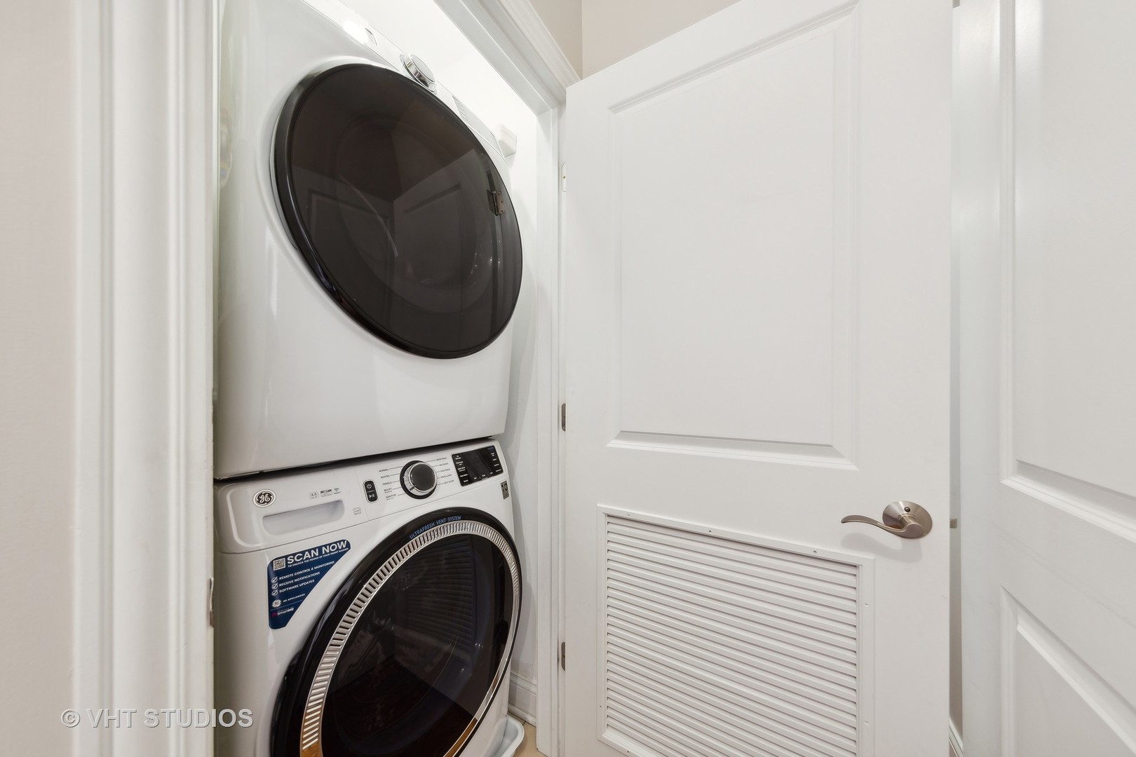 2136 West Division Street, Unit 3 Chicago, IL 60622 - Photo 27 of 37 a view of a hallway with washer and dryer