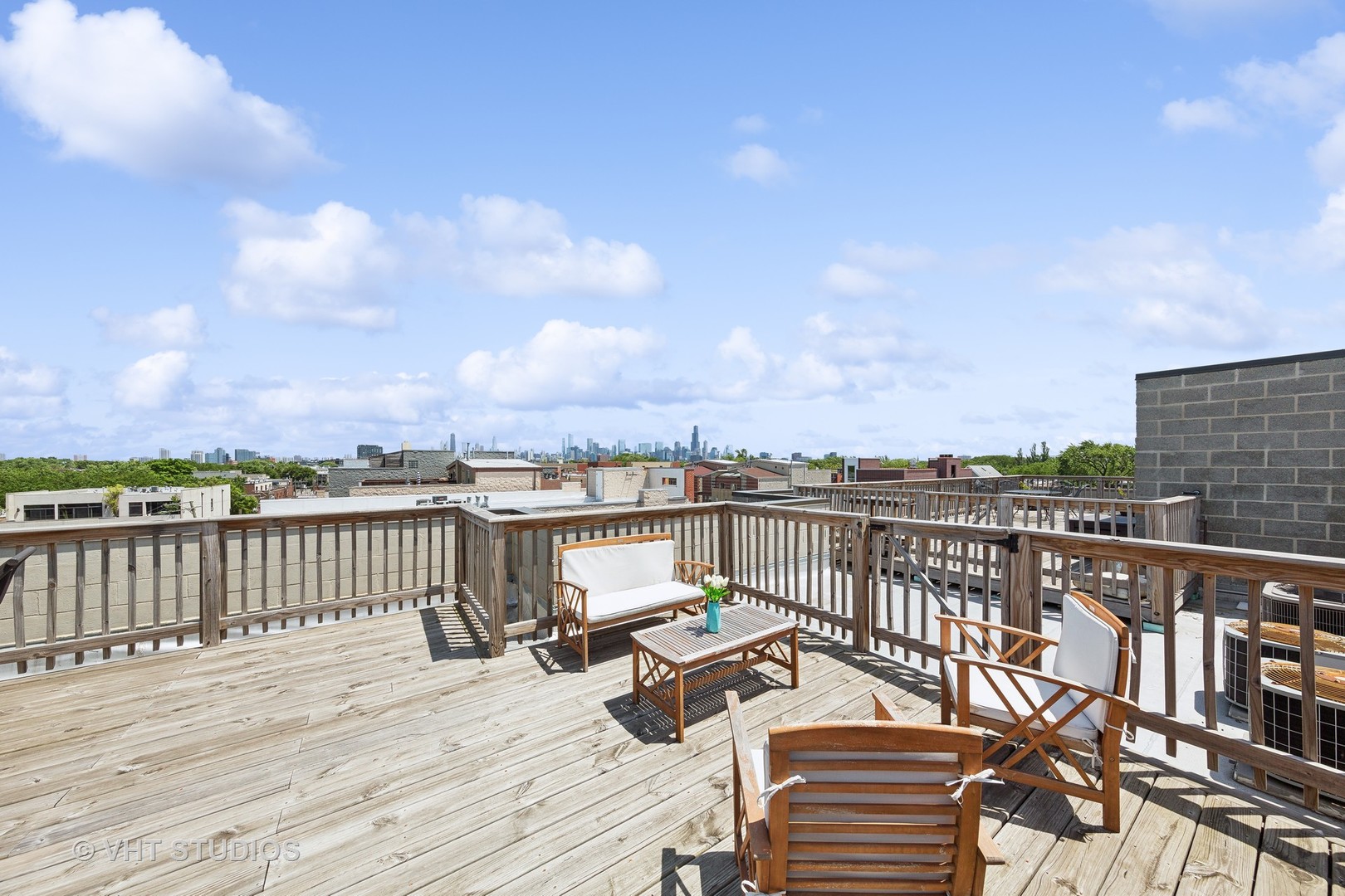 2136 West Division Street, Unit 3 Chicago, IL 60622 - Photo 31 of 37 a view of a terrace with wooden floor and city view