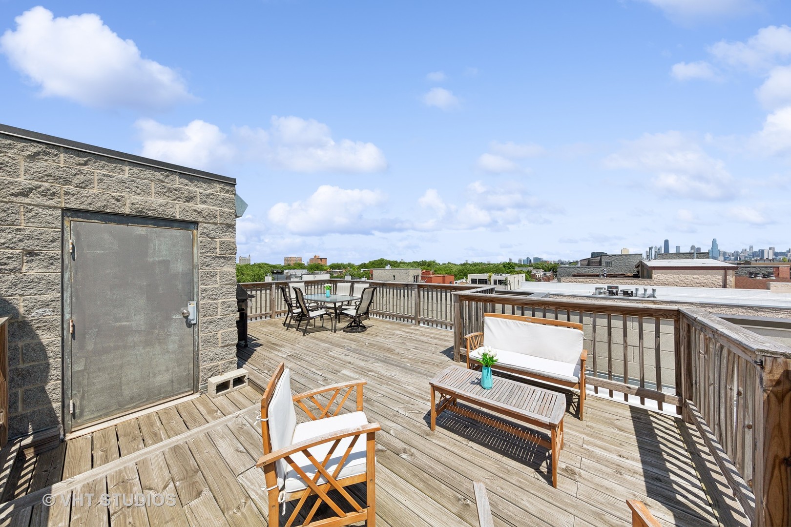 2136 West Division Street, Unit 3 Chicago, IL 60622 - Photo 33 of 37 a view of roof deck with seating space and barbeque oven