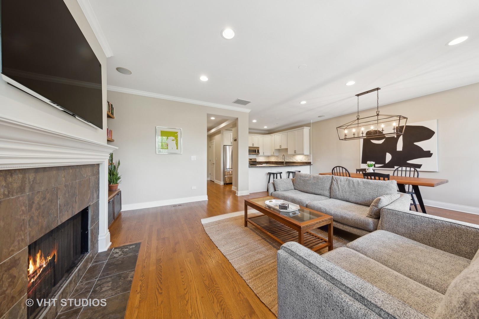 2136 West Division Street, Unit 3 Chicago, IL 60622 - Photo 6 of 37 a living room with furniture and a fireplace