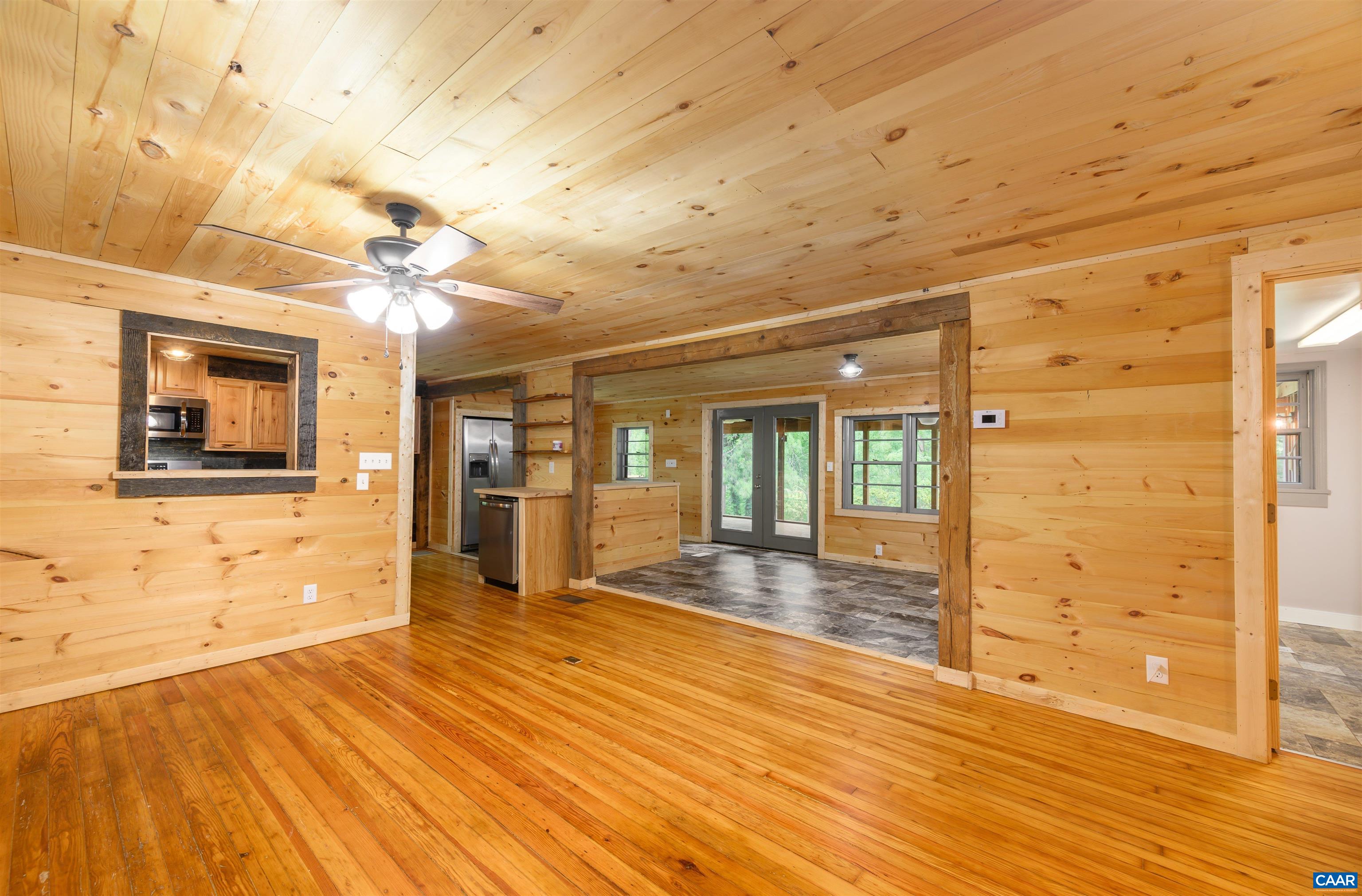 3882 Firehouse Road Howardsville, VA 24562 - Photo 4 of 75 a view of a room with wooden floor and door