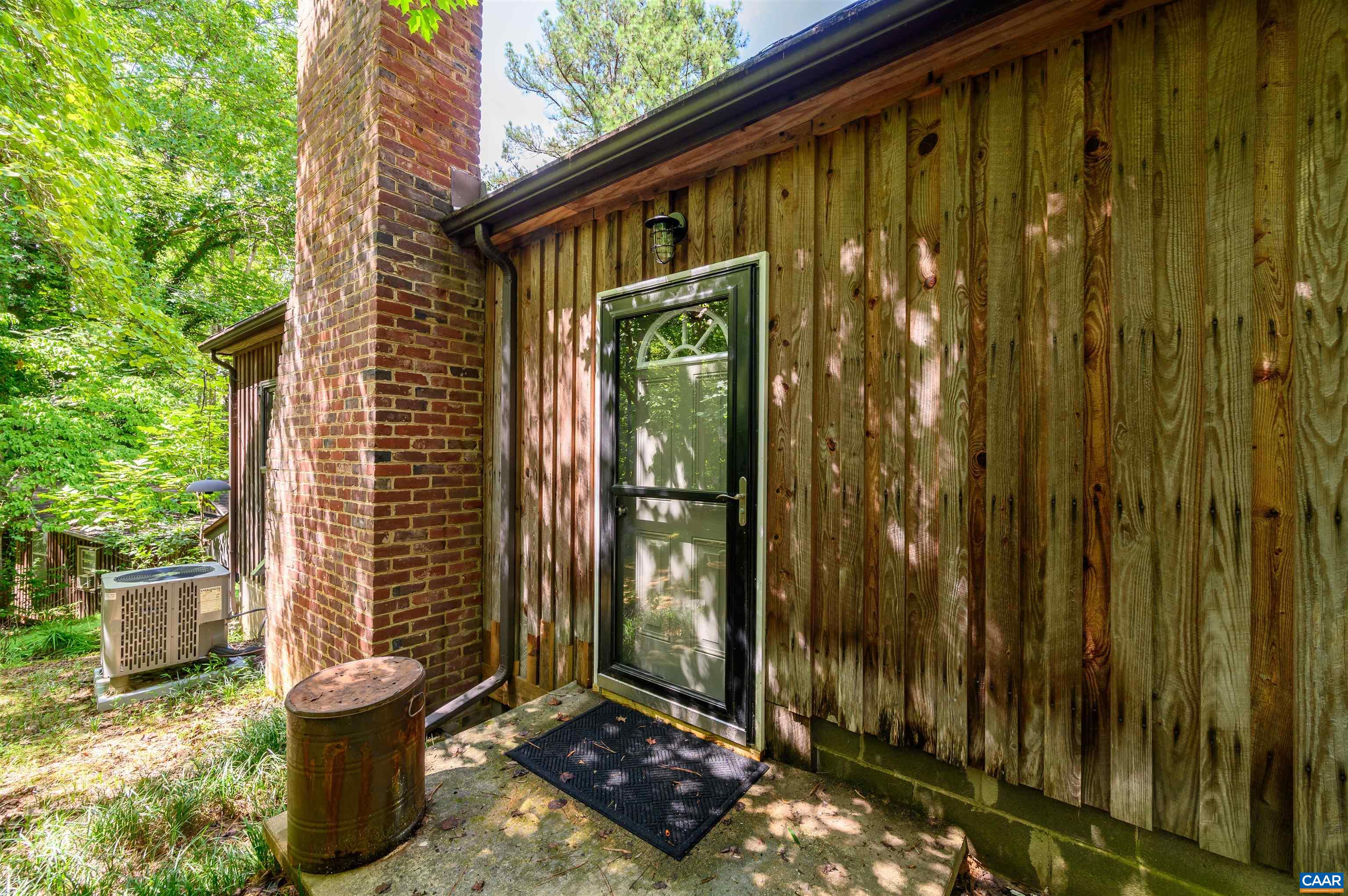 3882 Firehouse Road Howardsville, VA 24562 - Photo 41 of 75 a view of a porch with potted plants