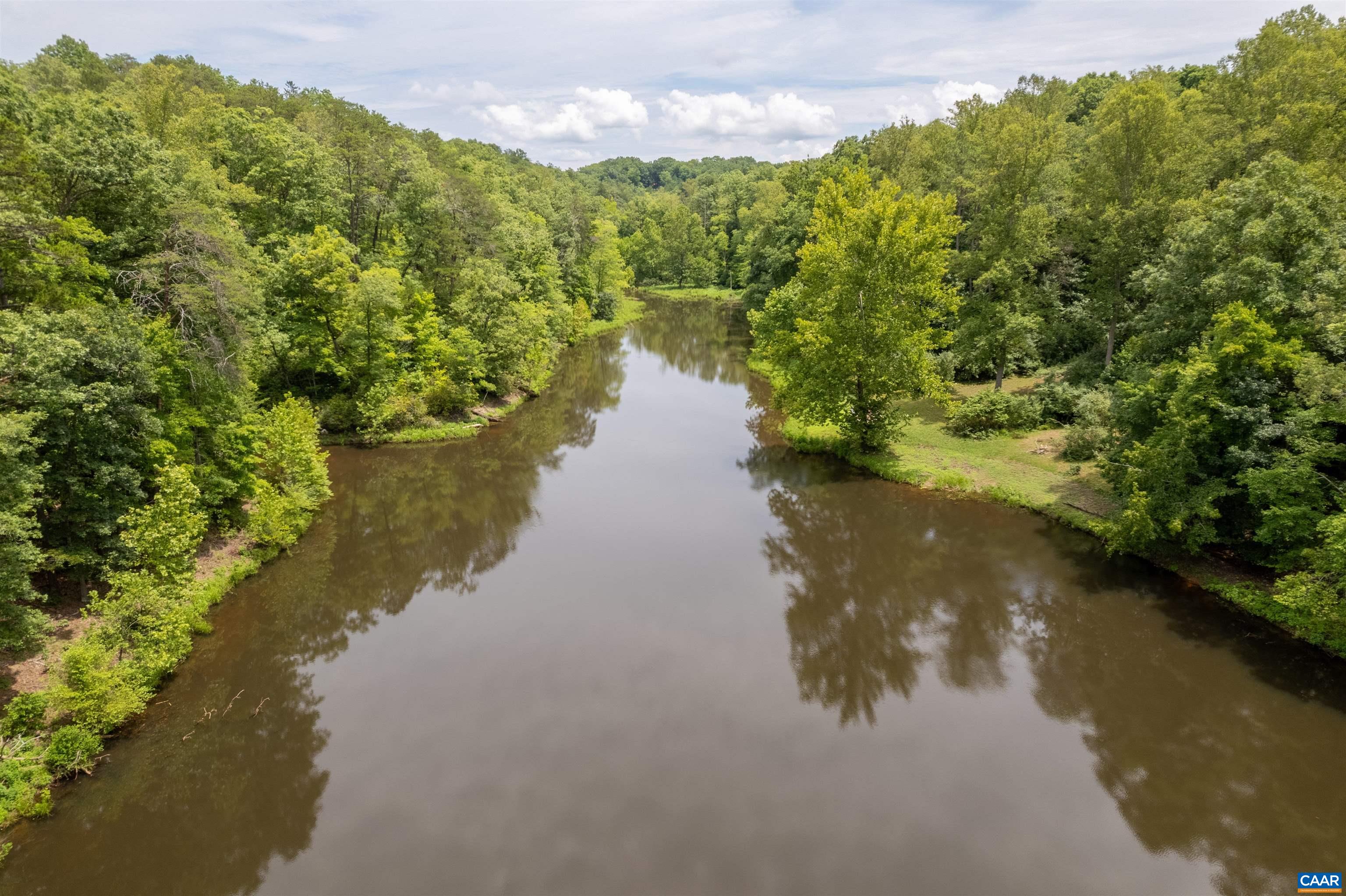 3882 Firehouse Road Howardsville, VA 24562 - Photo 64 of 75 a view of a lake from a yard