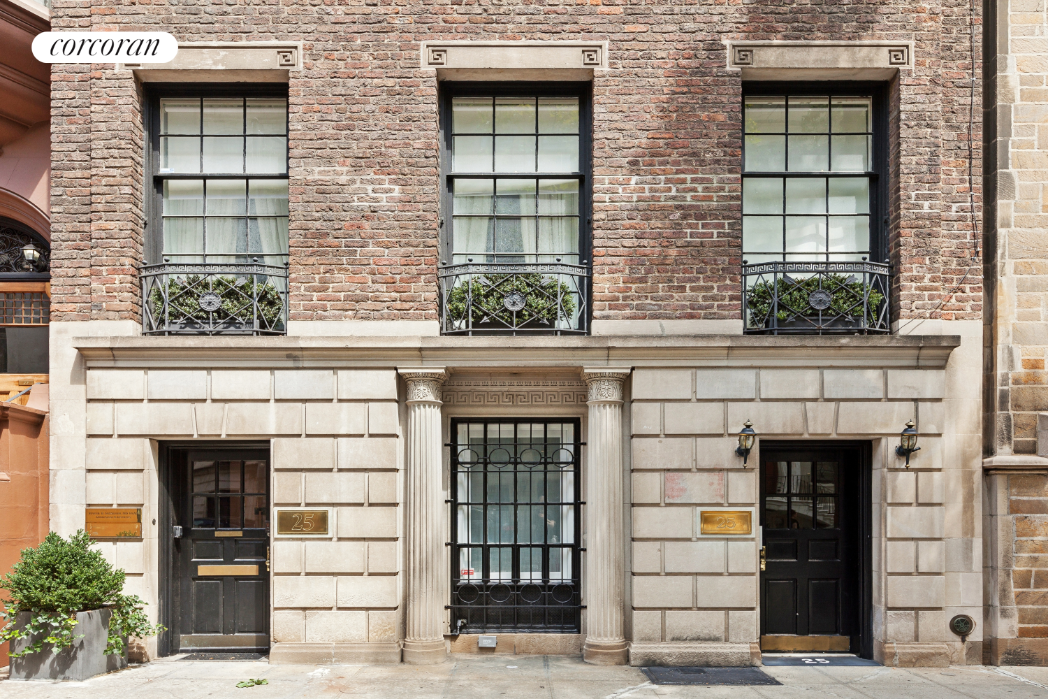 25 East 69th Street, Unit 3A Manhattan, NY 10021 - Photo 6 of 8 a front view of a house with a large windows
