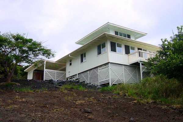 88-2256 Milolii Road Captain Cook, HI 96704 - Photo 6 of 15 a front view of a house with a yard