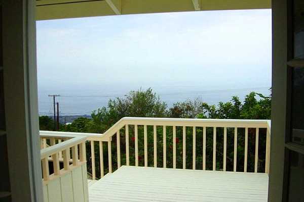 88-2256 Milolii Road Captain Cook, HI 96704 - Photo 8 of 15 a view of balcony with wooden floor and fence