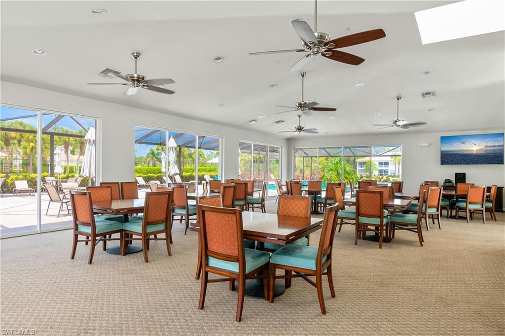 6838 Lantana Bridge Road, Unit 103 Naples, FL 34109 - Photo 35 of 41 a view of a dining room with furniture window and outside view