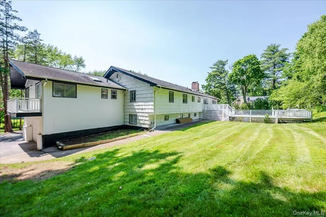 a view of swimming pool with backyard