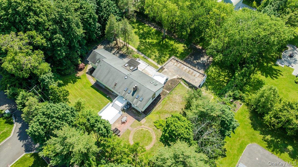 452 East Shore Road Great Neck, NY 11024 - Photo 34 of 35 an aerial view of a house with a yard