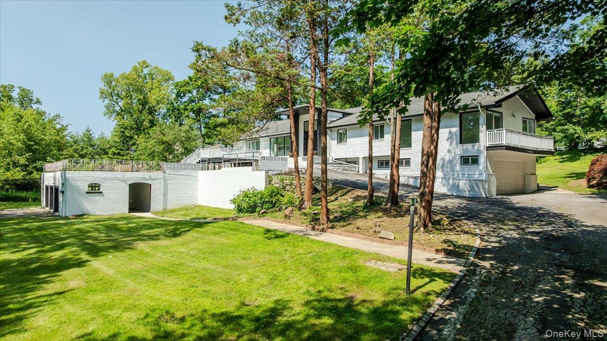 452 East Shore Road Great Neck, NY 11024 - Photo 35 of 35 a house view with a outdoor space