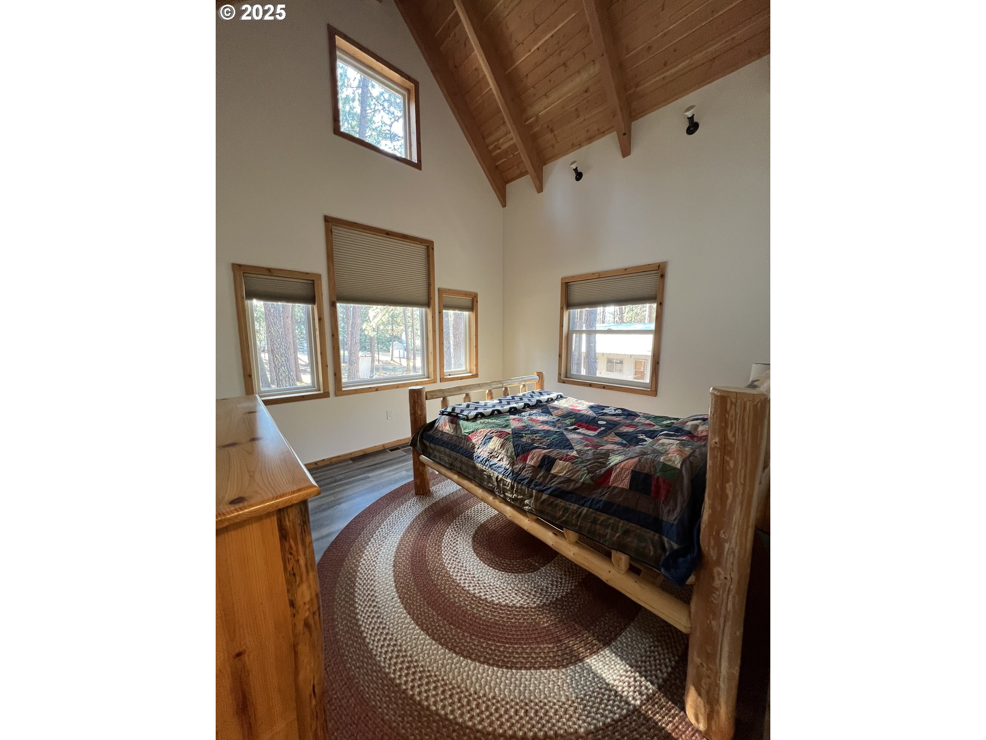 455 East Auburn Street Sumpter, OR 97877 - Photo 11 of 25 a bed room with a bed and windows