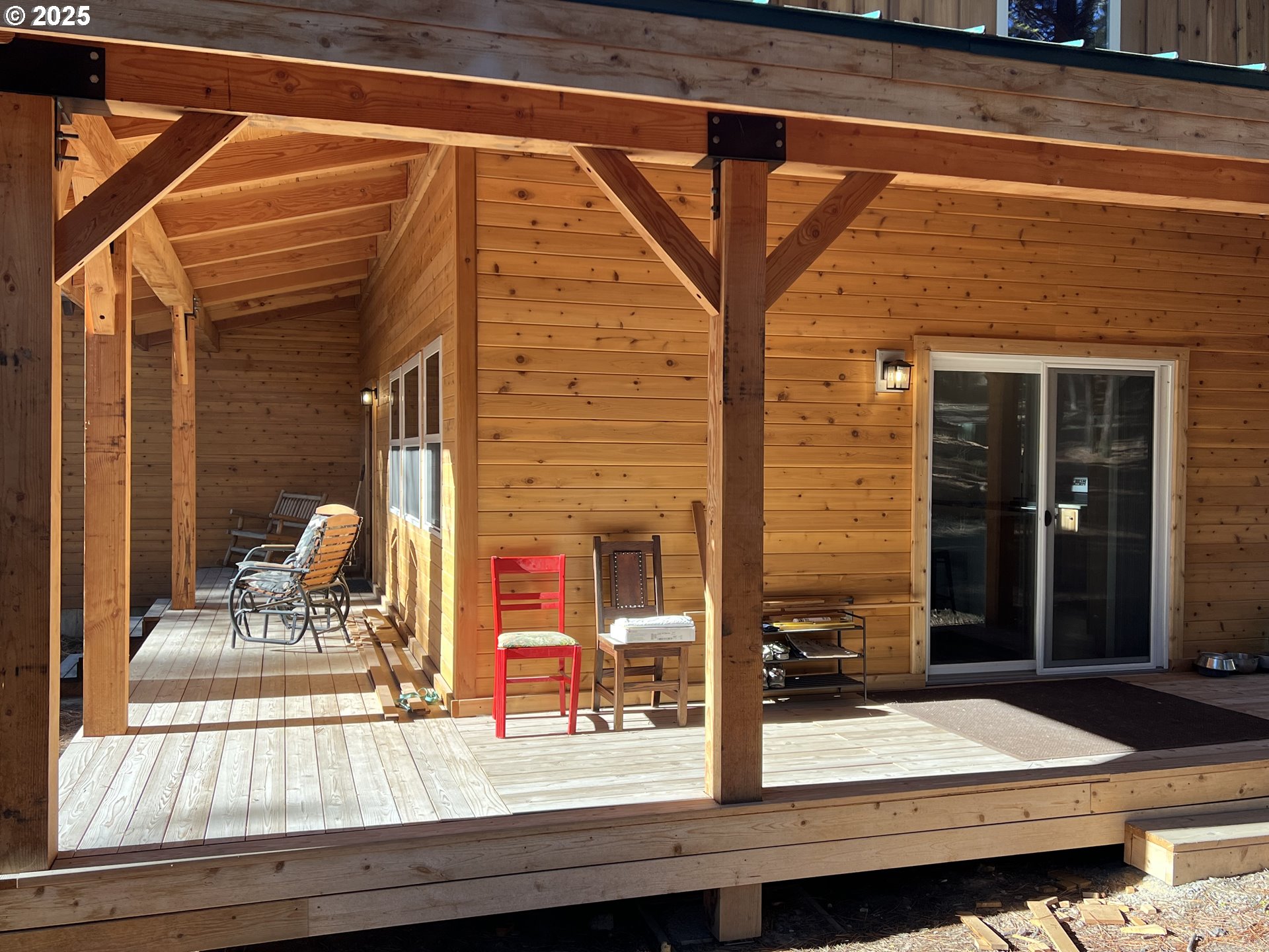 455 East Auburn Street Sumpter, OR 97877 - Photo 23 of 25 a outdoor view of a house with a lounge chair