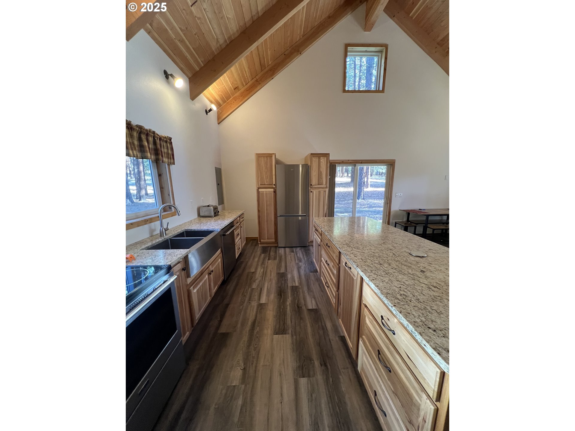455 East Auburn Street Sumpter, OR 97877 - Photo 9 of 25 a view of a kitchen from a hallway