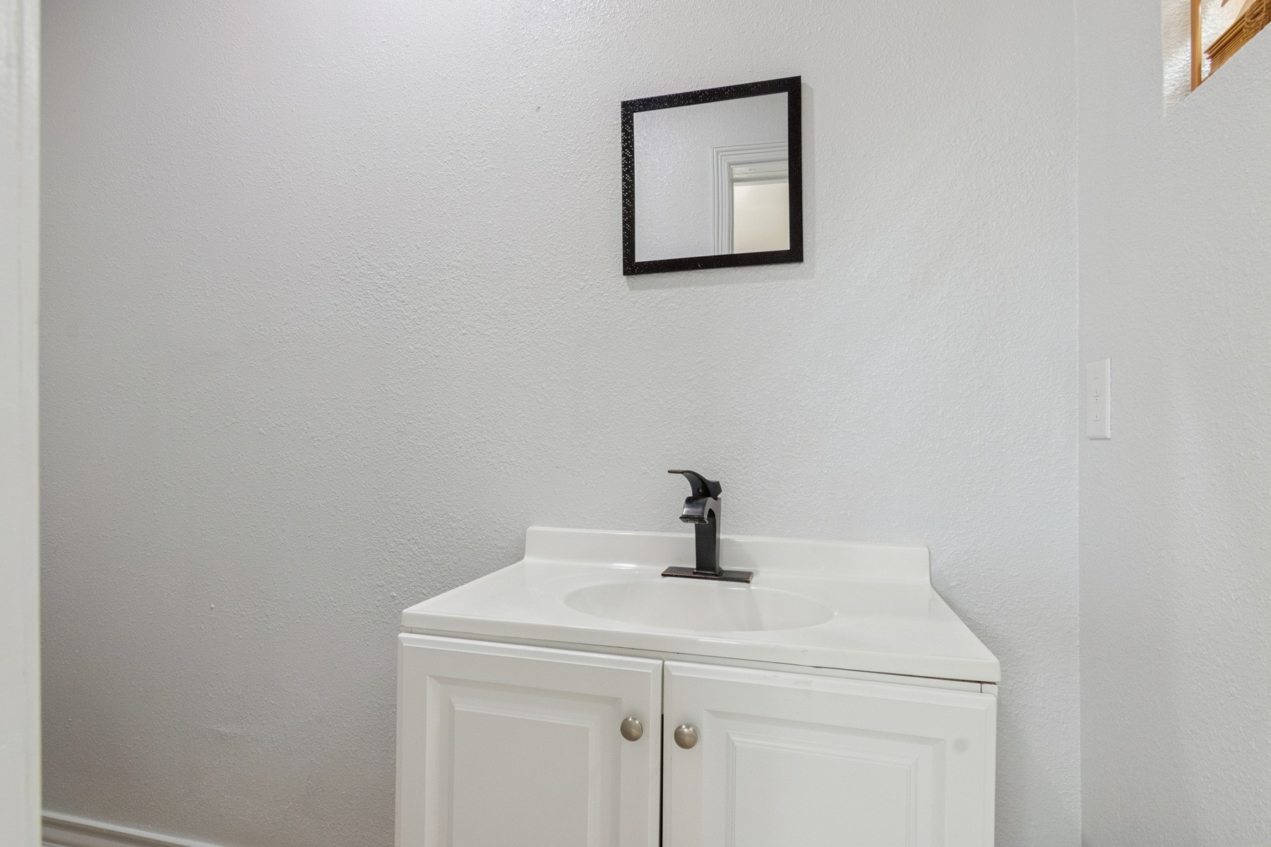 4505 Cochran Street Houston, TX 77009 - Photo 23 of 25 a bathroom with a sink and vanity