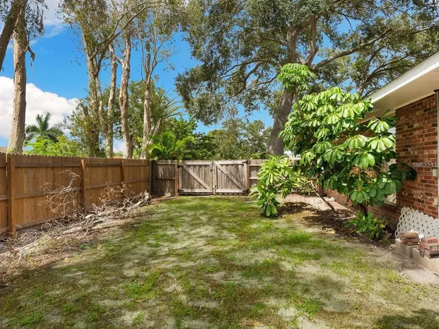 a house with a yard in front of it