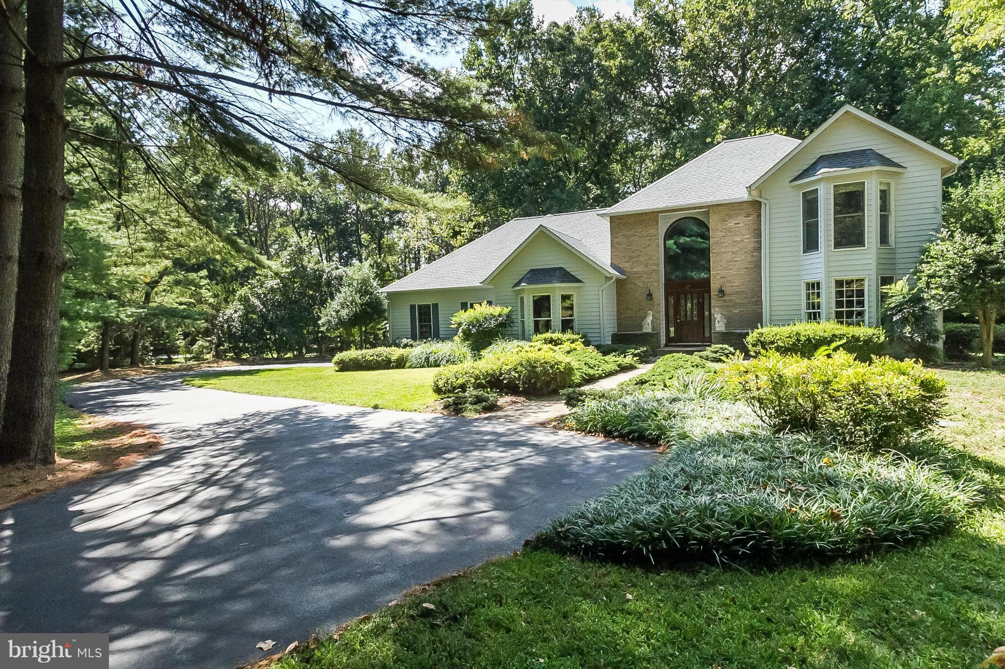 27 Shadow Point Court Edgewater, MD 21037 - Photo 25 of 29 Nestled among abundant plants and trees