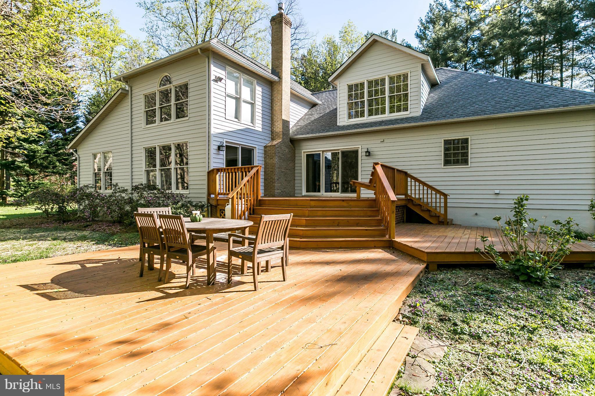 27 Shadow Point Court Edgewater, MD 21037 - Photo 26 of 29 New deck in 2015 with 3 seating areas