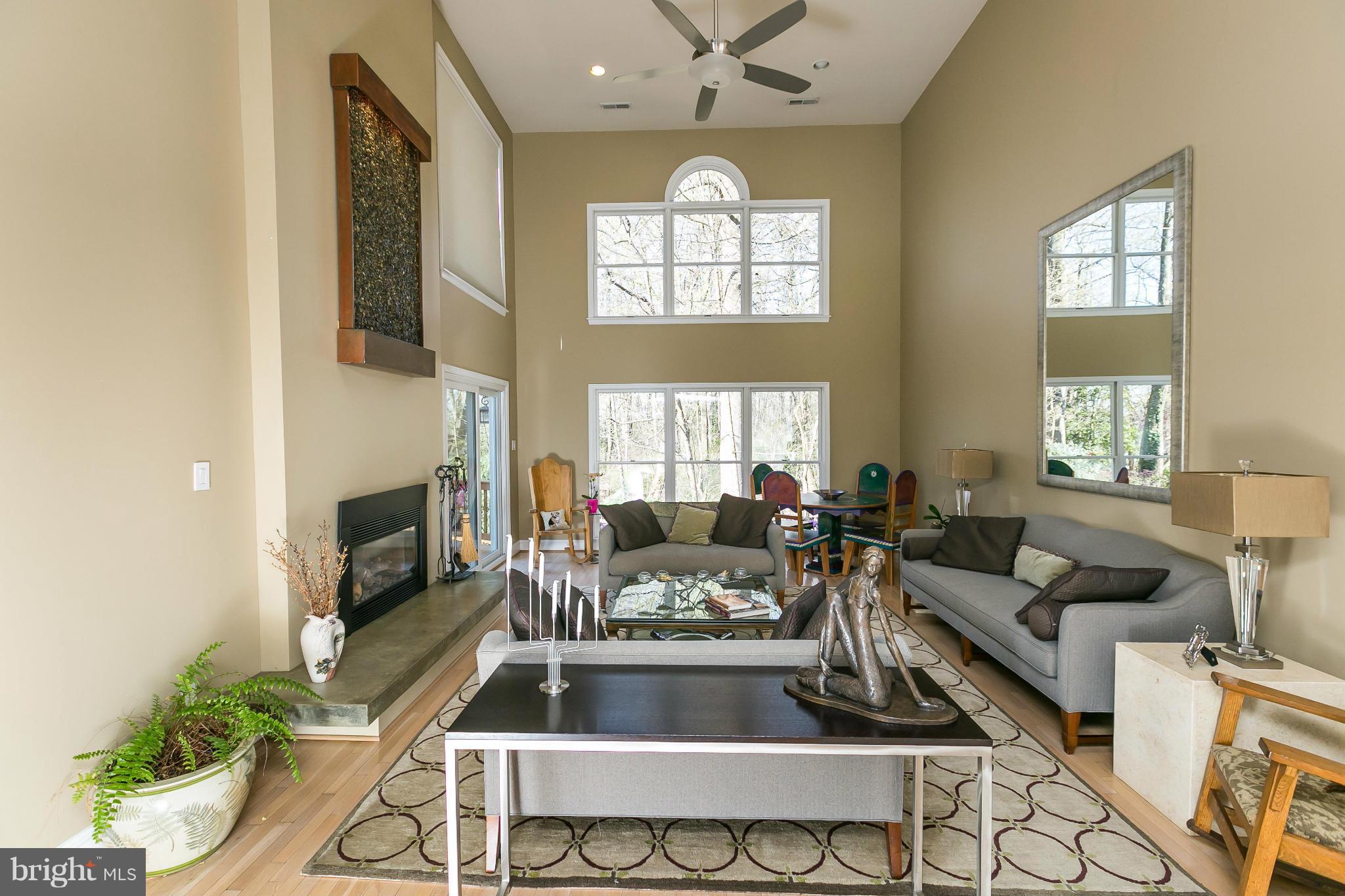 27 Shadow Point Court Edgewater, MD 21037 - Photo 5 of 29 Wall of windows with wooded views