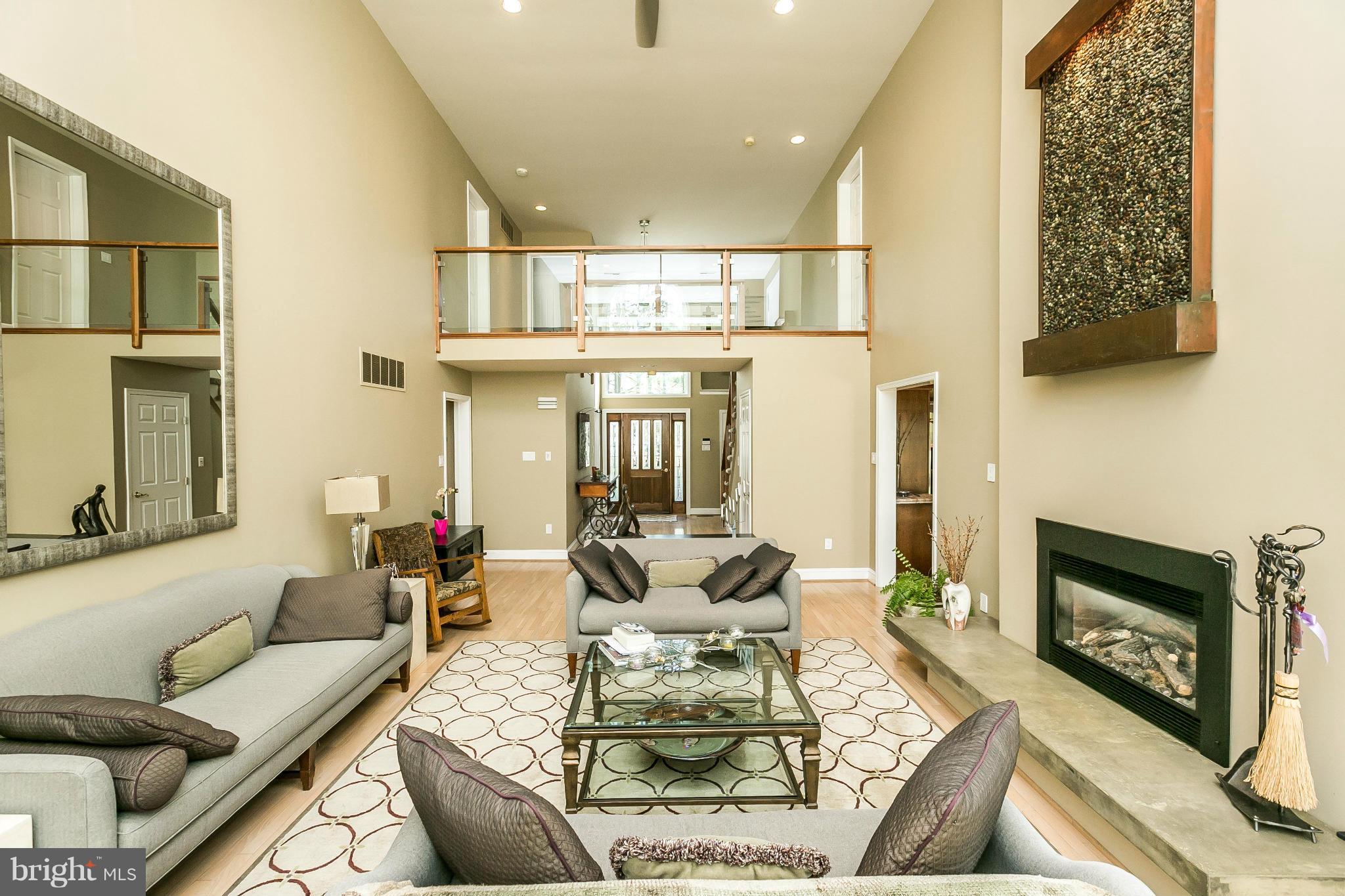 27 Shadow Point Court Edgewater, MD 21037 - Photo 7 of 29 Gas fireplace with raised hearth