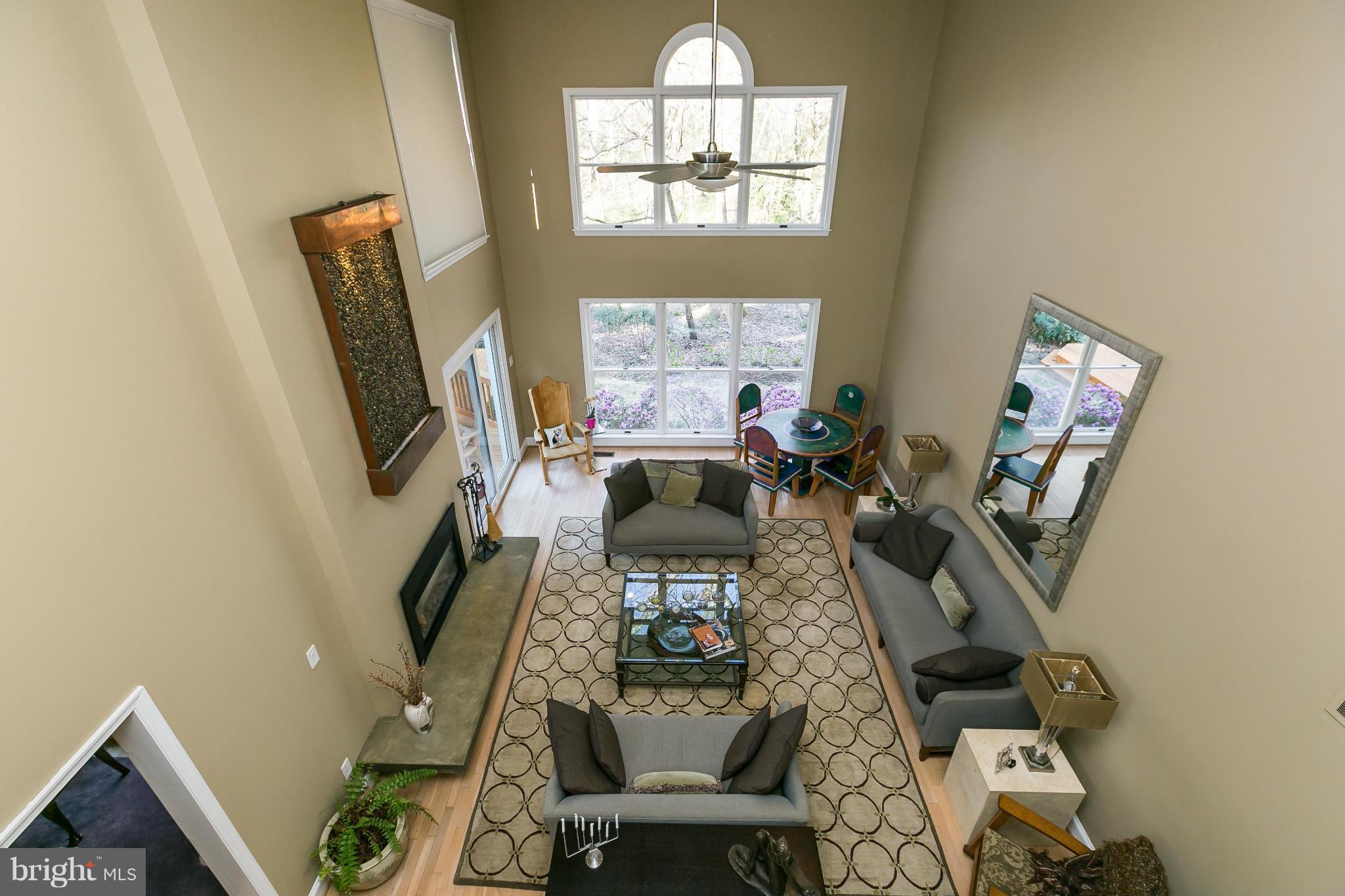 27 Shadow Point Court Edgewater, MD 21037 - Photo 8 of 29 Mounted waterfall over fireplace conveys