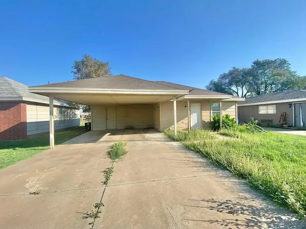a view of a house with a patio