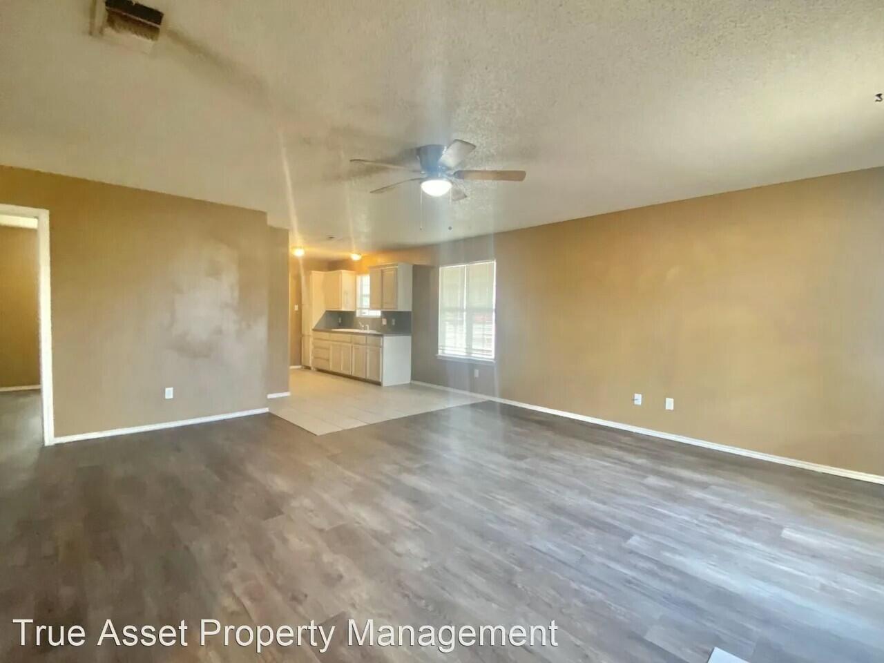 Package Package Property Lubbock, TX 79415 - Photo 11 of 45 an empty room with a empty space and windows