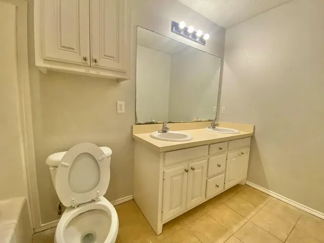 a view of a house with snow on the background