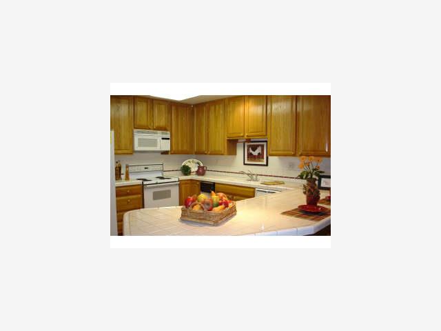 800 East Charleston Road, Unit 20 Palo Alto, CA 94303 - Photo 3 of 8 a kitchen with a sink cabinets and appliances