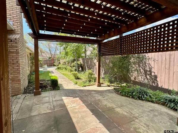 a house view with a garden space